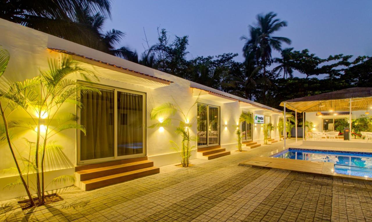 Treebo Code Red Hotel Morjim Exterior foto